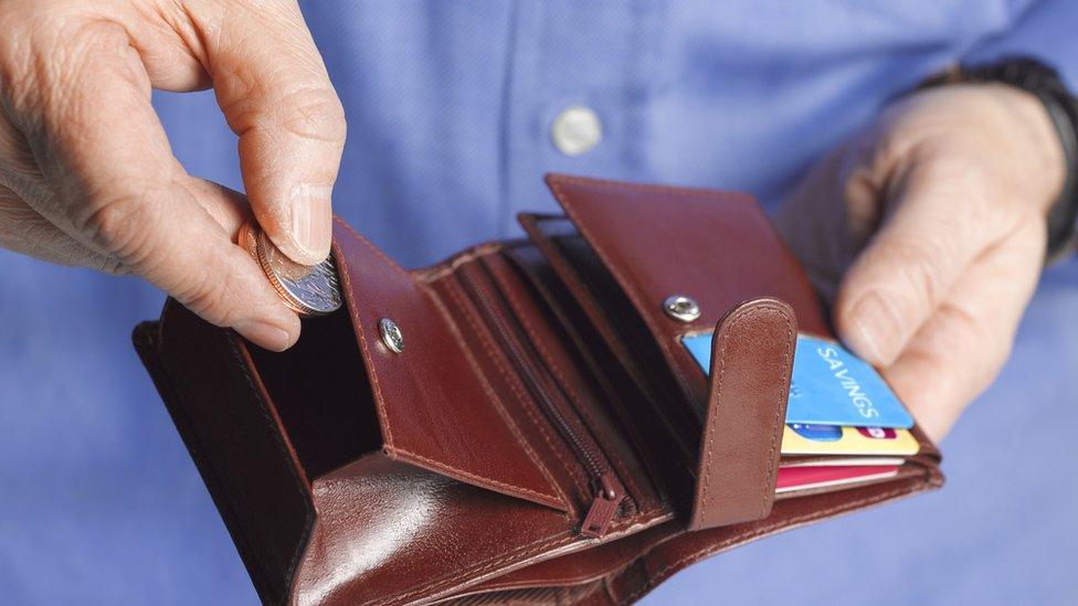 Man checking wallet