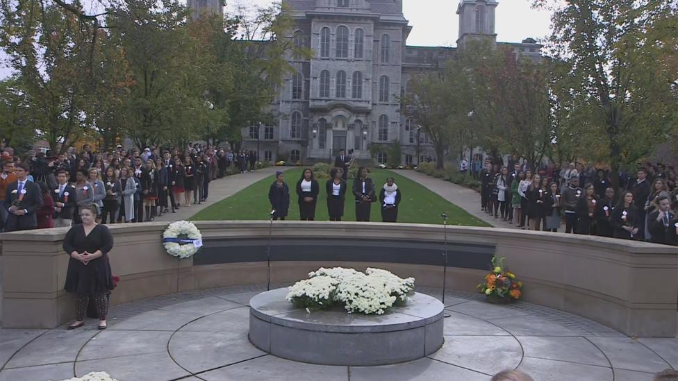 rose laying ceremony at Syracuse University