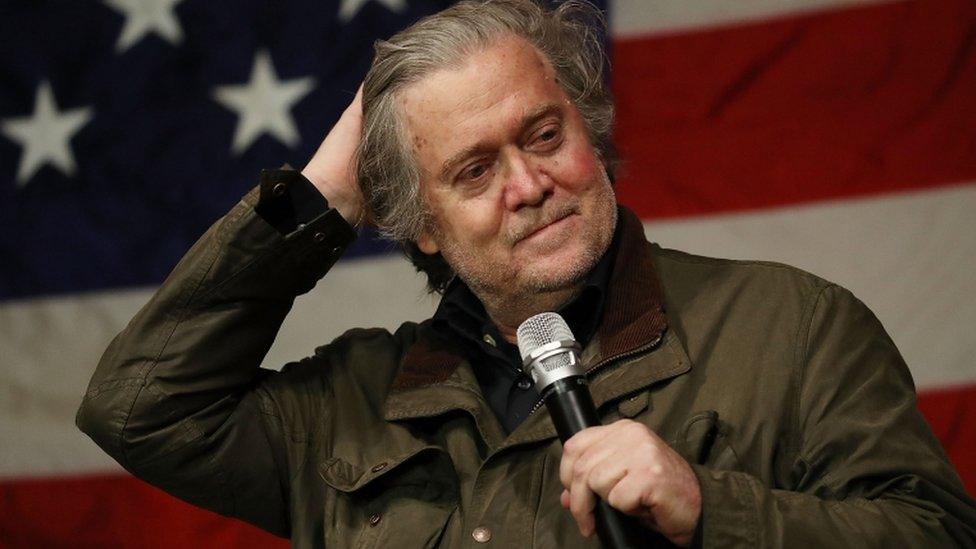 Steve Bannon in front of a US flag introduction Republican senatorial candidate Roy Moore at December event