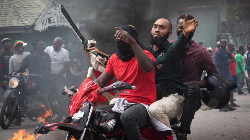 Protesters participate in a large anti-government protest in Port-au-Prince, Haiti, 07 February 2024.