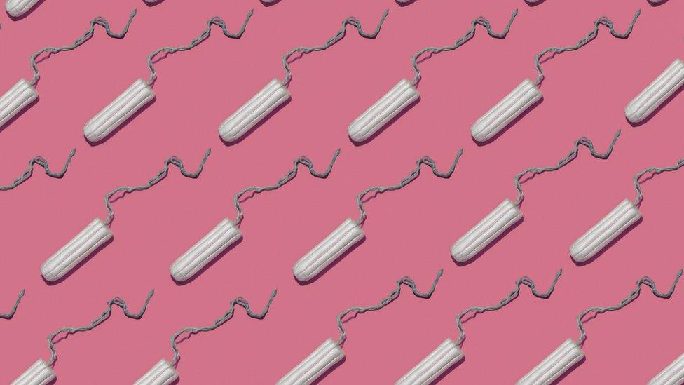 tampons on pink background