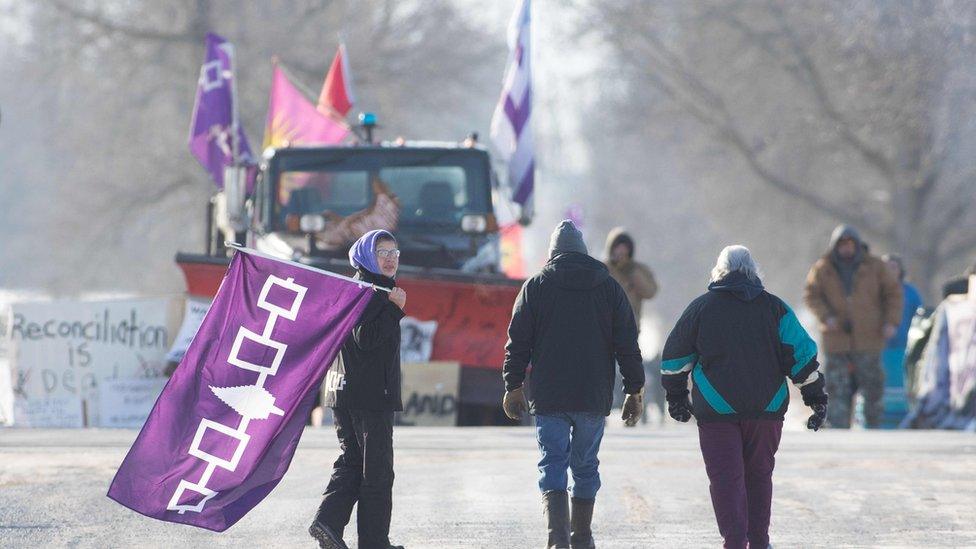 Protesters arrive with a Sixth Nations flag to the train blockade near Belleville, Ontario.