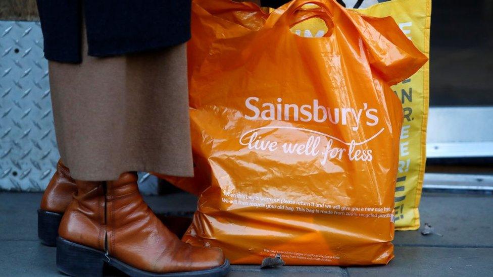 Sainsbury's bag with the slogan "live well for less"