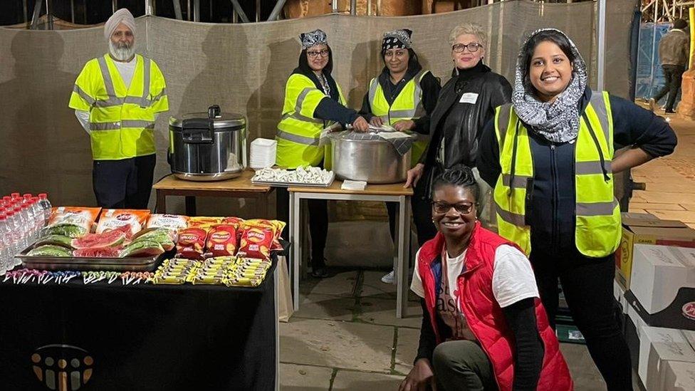 Staff at St Basils ready to serve food