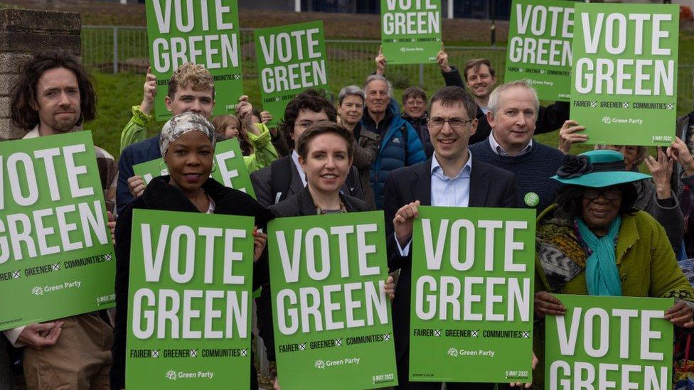 Joint Green Party leaders Adrian Ramsay and Carla Denyer stand in a housing estate in Crystal Palace