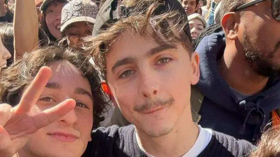 selfie of timothee and lookalike