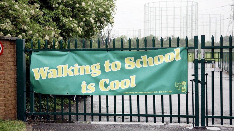 Walking to school is cool campaign sign