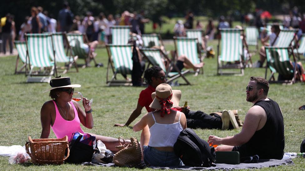 Visitors to Green Park, London