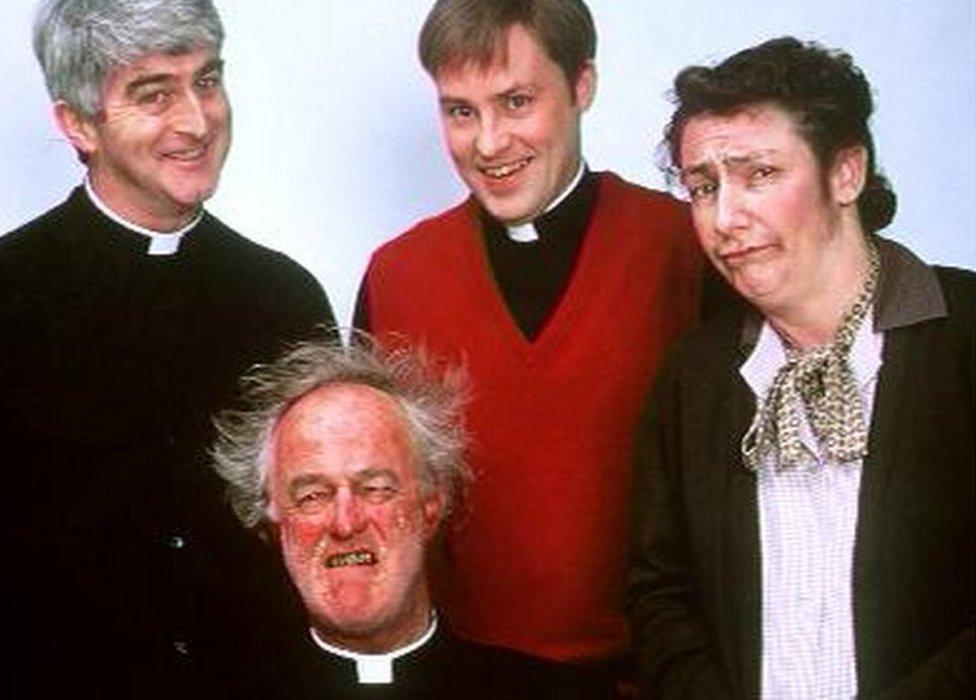 Dermot Morgan as the eponymous Father Ted Crilly, alongside fellow priests Father Dougal McGuire (Ardal O'Hanlon) and Father Jack Hackett (Frank Kelly) with Mrs Doyle (Pauline McLynn).