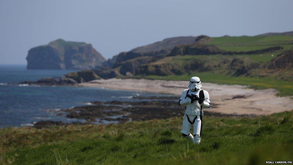 Star Wars fan John Joe McGettigan in stormtrooper costume walking along the Donegal coast