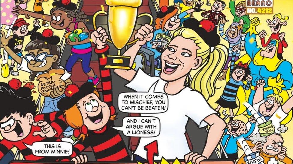 Lioness Leah Williamson stood on open top bus with other characters from the Beano