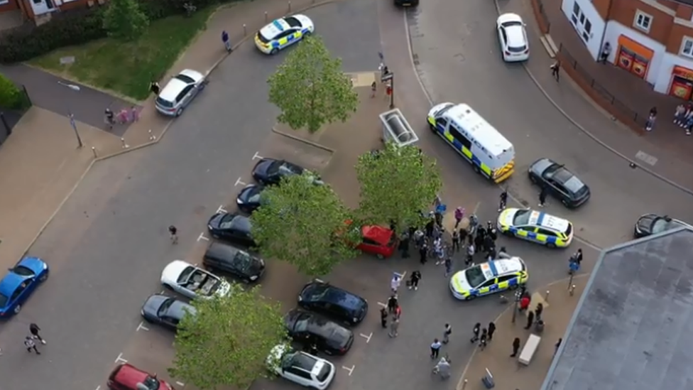 Police officers at music video shoot