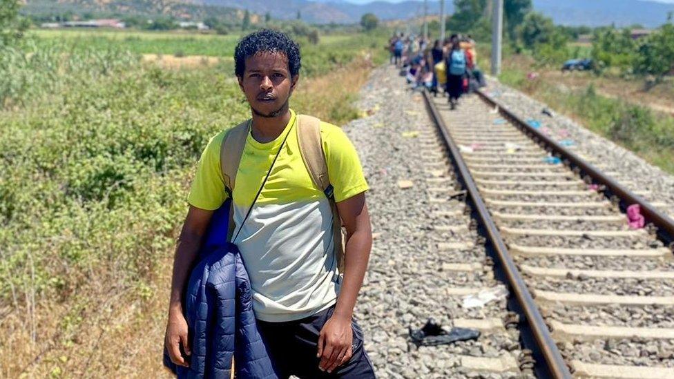 Elmi Elmi on location by a railway track