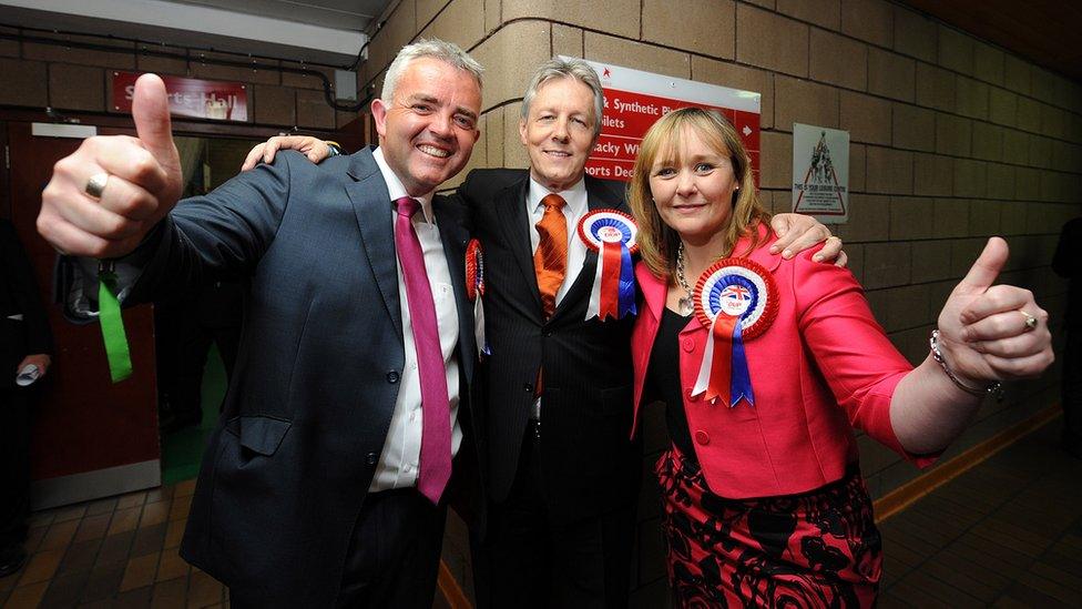 Michelle McIlveen, seen here in 2011 with Jonathan Bell and Peter Robinson