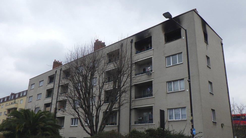 Image showing Maddocks House, with blown-out windows and smoke damage to a top-floor flat.