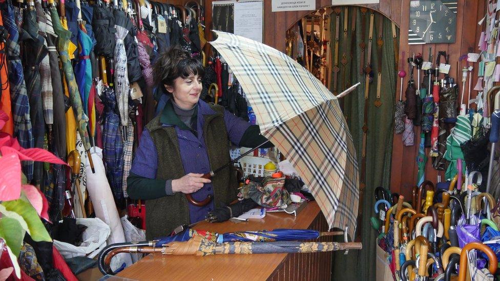 Tanja Zivkovic in her umbrella repair shop