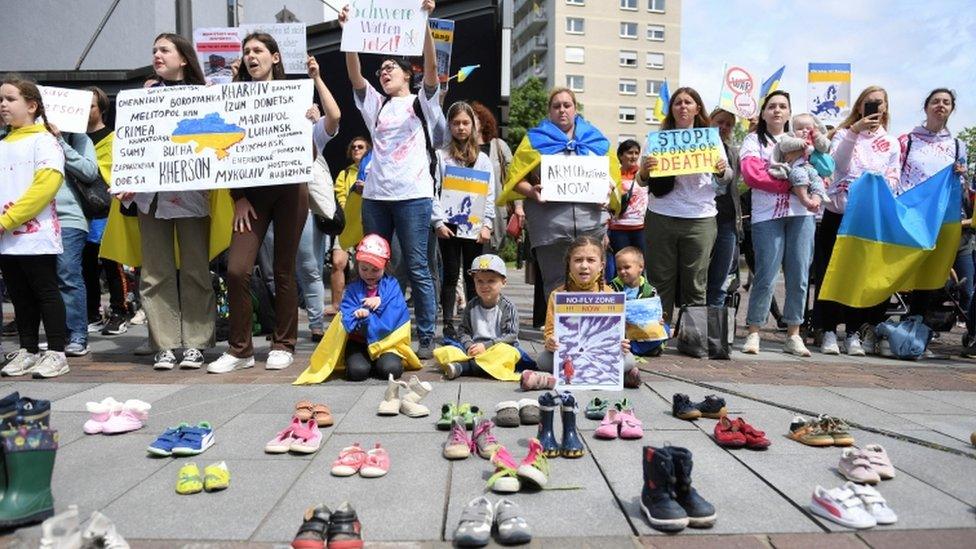 Anti-war in Ukraine demonstrators protest during the 102nd German Katholikentag in Stuttgart, Germany, May 27, 2022.