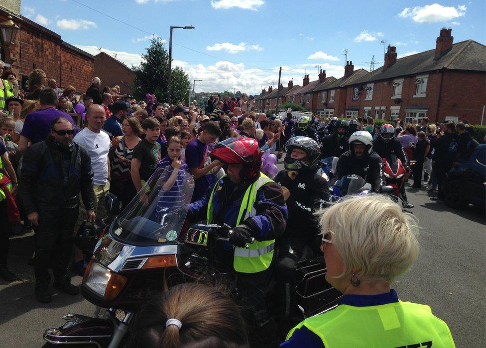 Bikers riding to the weir