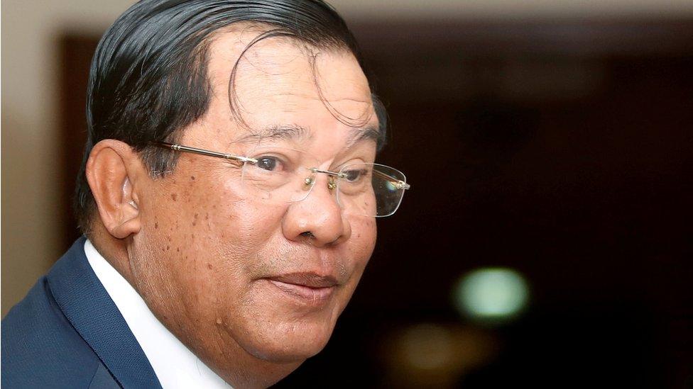 Cambodia's Prime Minister Hun Sen smiles as he arrive at the National Assembly of Cambodia during a plenary session, in central Phnom Penh, 20 February 2017.