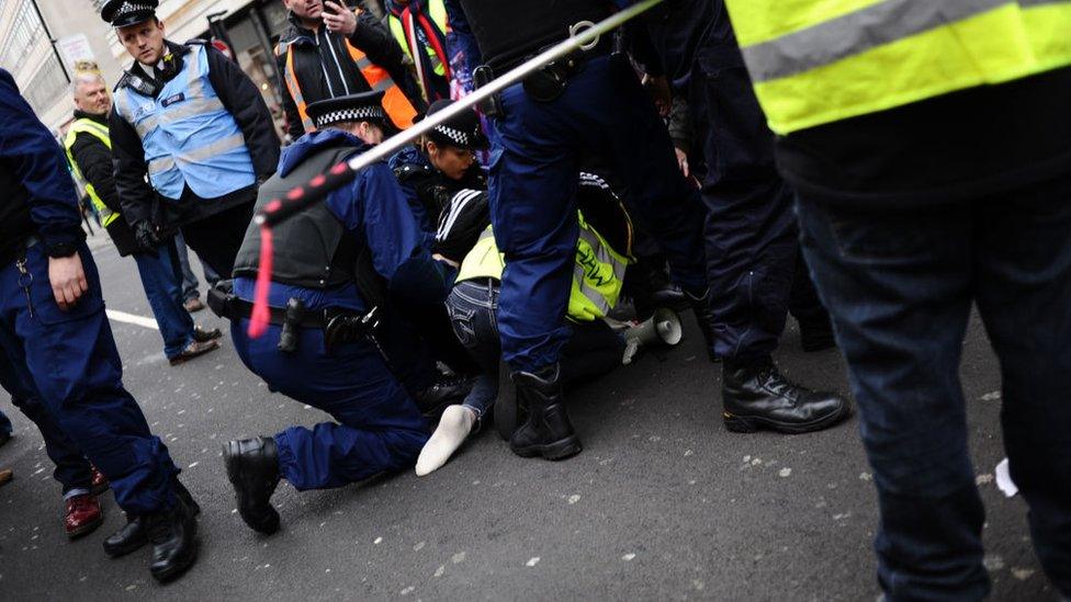 Pro-Brexit 'yellow vest' activists clash with police on Haymarket in London