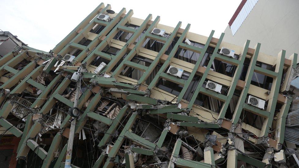 A fallen building after a powerful earthquake hit Ecuador