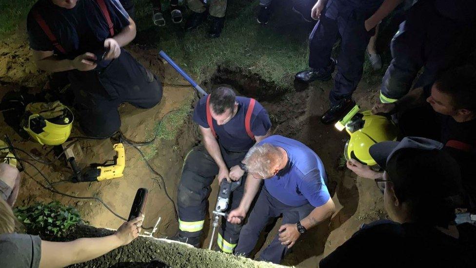 Rescuers drilling bunker