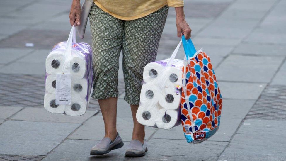 Woman with toilet roll