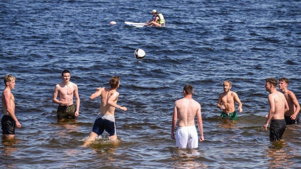 A group of young men took a dip in the waters of Luss, Scotland.