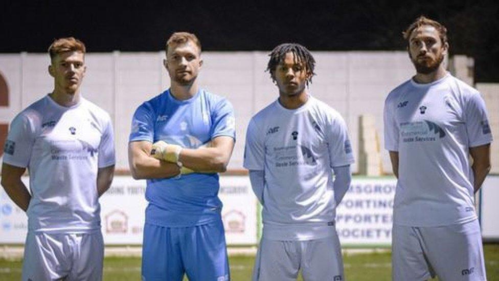 Football players in white kit