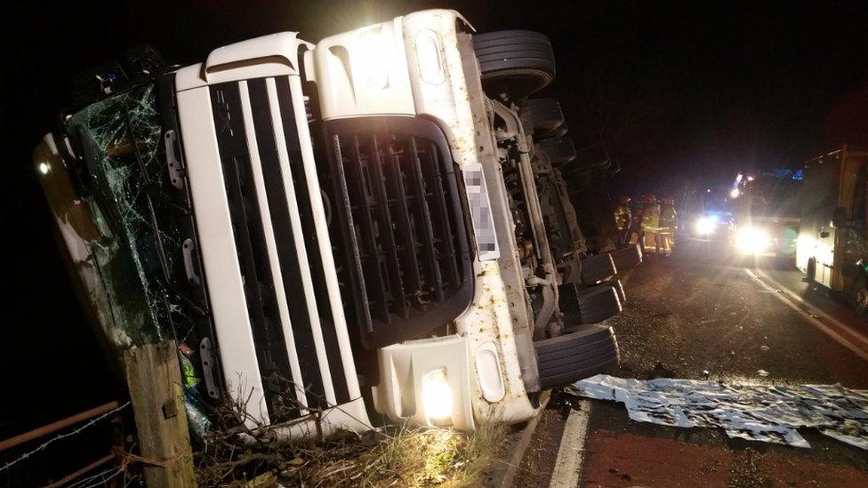 The lorry on its side