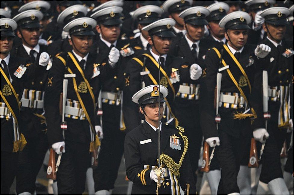 Indian Coast Guard cadets march past during India's 75th Republic Day parade in New Delhi on January 26, 2024