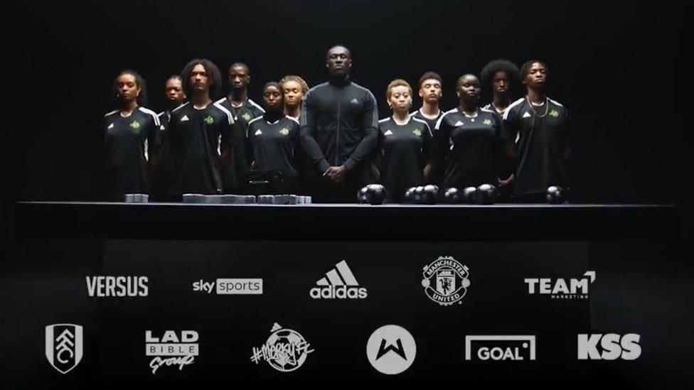 Stormzy announcement video for Merky FC with young black people stood with the rapper.