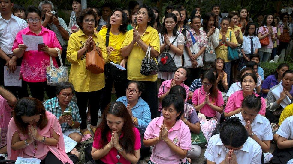 Well-wishers pray for Thailand's King Bhumibol Adulyadej at the Siriraj hospital where he is residing in Bangkok, Thailand, 12 October 2016.