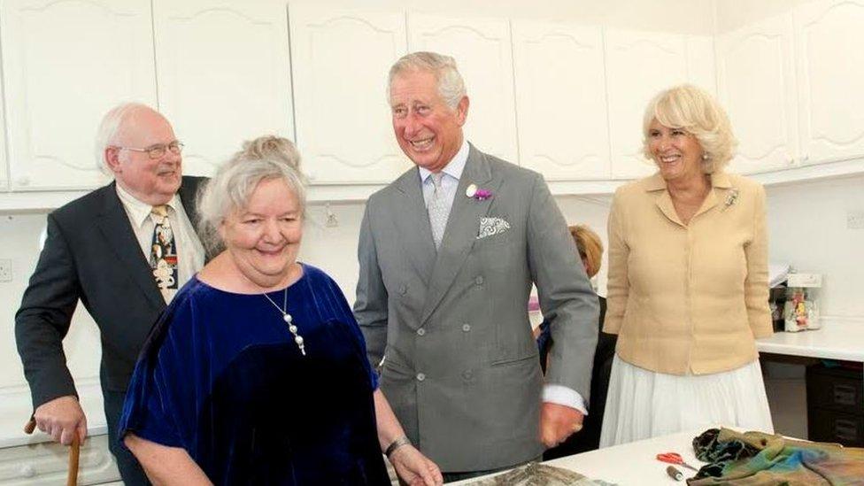 Prince Charles and the Duchess of Cornwall visit Patricia and Charles Lester at their fashion studio in Abergavenny, Monmouthshire