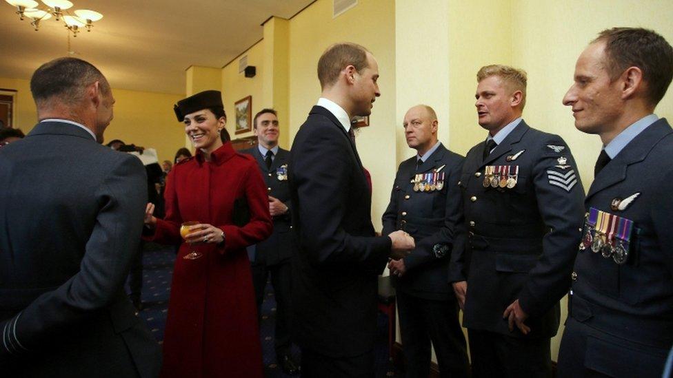 Prince William and the Duchess of Cambridge at a reception after a ceremony marking the end of RAF search and rescue operations at RAF Valley in Wales