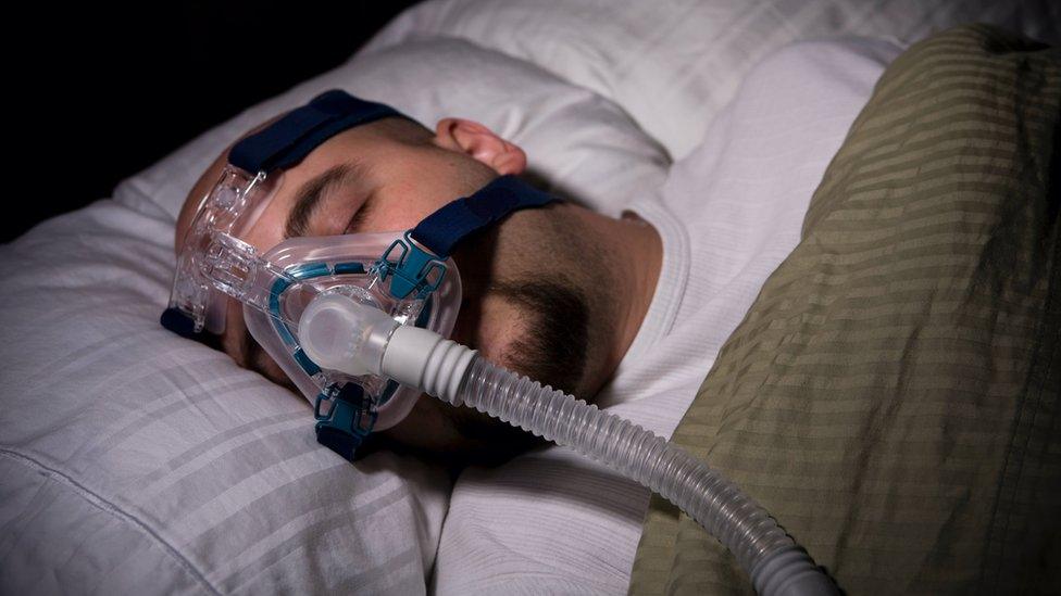 A man using a CPAP machine