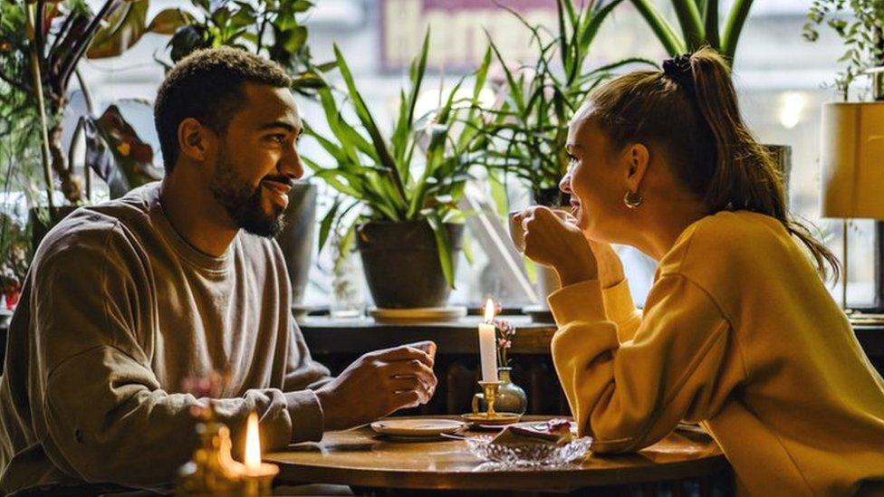 Couple on a weekend date at cafe