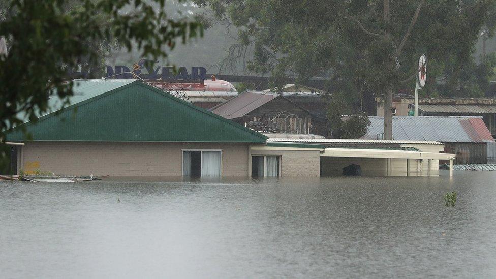 A house in flood water is seen outside of Richmond on March 23, 2021 in Sydney, Australia