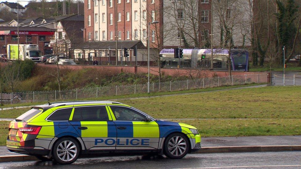 Police car and a Glider in west Belfast