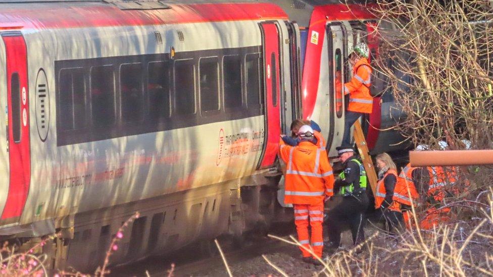 Firefighters at the train