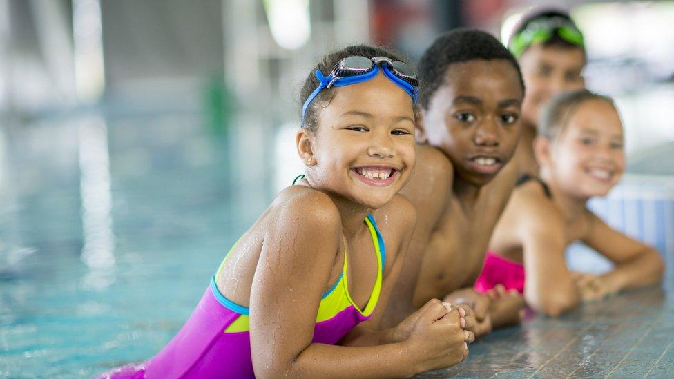 Children-of-different-ethnicities-at-a-swimming-pool.