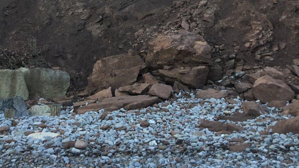 Rocks at the foot of a cliff