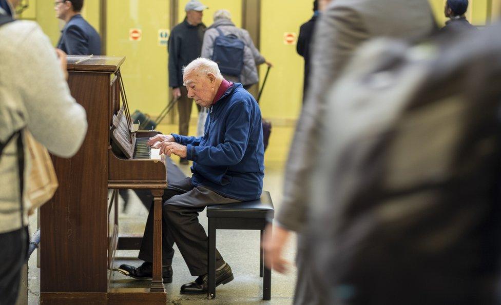 Denis Robinson plays at St Pancras station