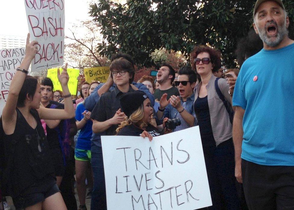 People protest outside the North Carolina Executive Mansion in Raleigh