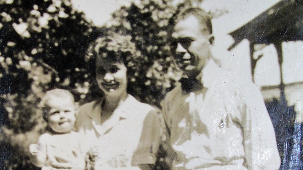 Triplett with his parents