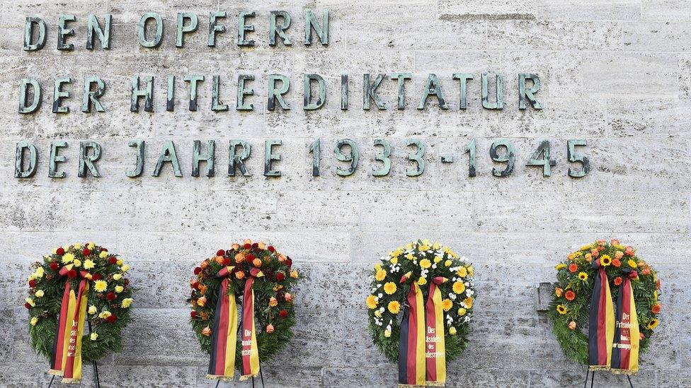 Wreaths are placed during a commemoration ceremony at the Plötzensee memorial site in Berlin in 2015