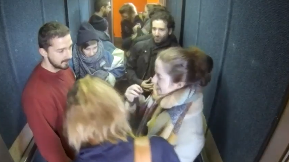 Shia LaBeouf (l) in a lift