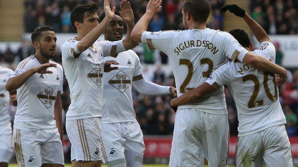 Swansea celebrate Gylfi Sigurdsson's winner against Chelsea