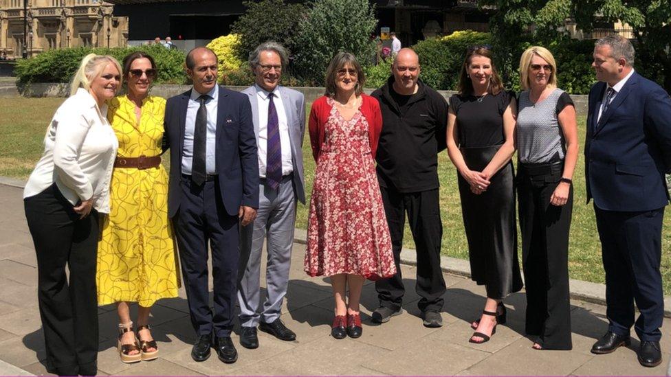 Bereaved parents and Baroness Kidron outside parliament: From left to right Hollie Dance, Lorin LaFave, Mariano Janin, Ian Russell, Baroness Beeban Kidron, Stuart Stephens, Amanda Stephens, Lisa Kenevan, Liam Walsh