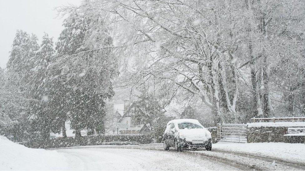 Snow covered road in Northumberland.